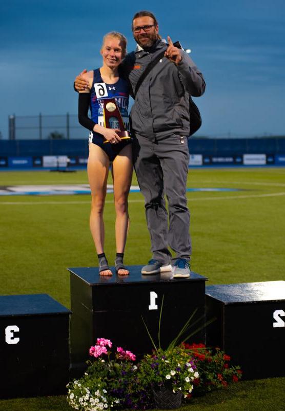 Ida Narbuvoll Celebrates NCAA 10K Championship with Head Coach Dennis Newell